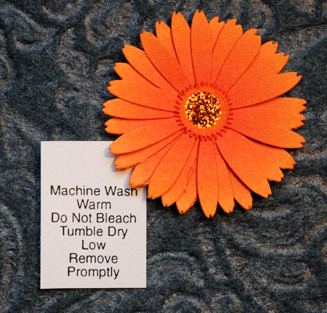 Machine Wash Warm Do Not Bleach (more)